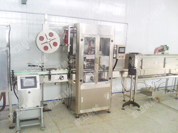 Sleeve label reducing machine